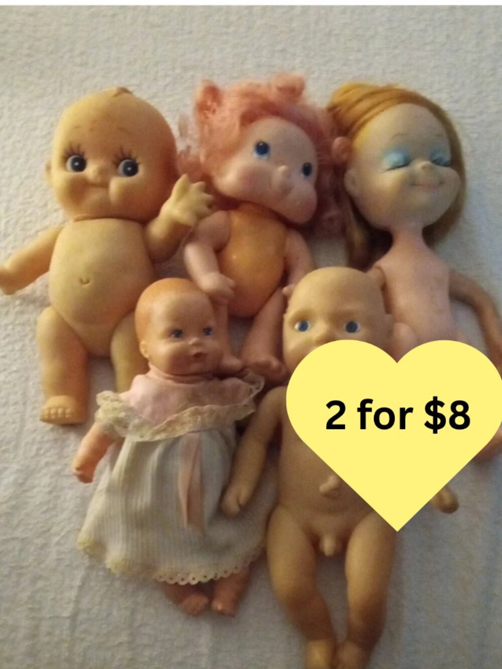 Five (5) Dolls